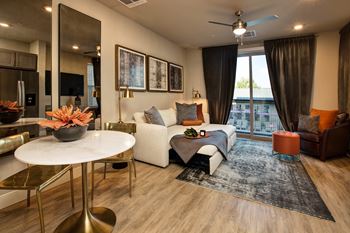 Hardwood inspired flooring throughout with plush carpet in the bedrooms*